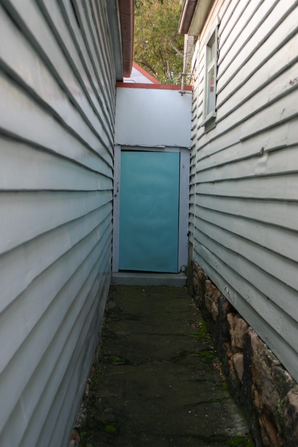 side lane. Access to sunroom at rear.