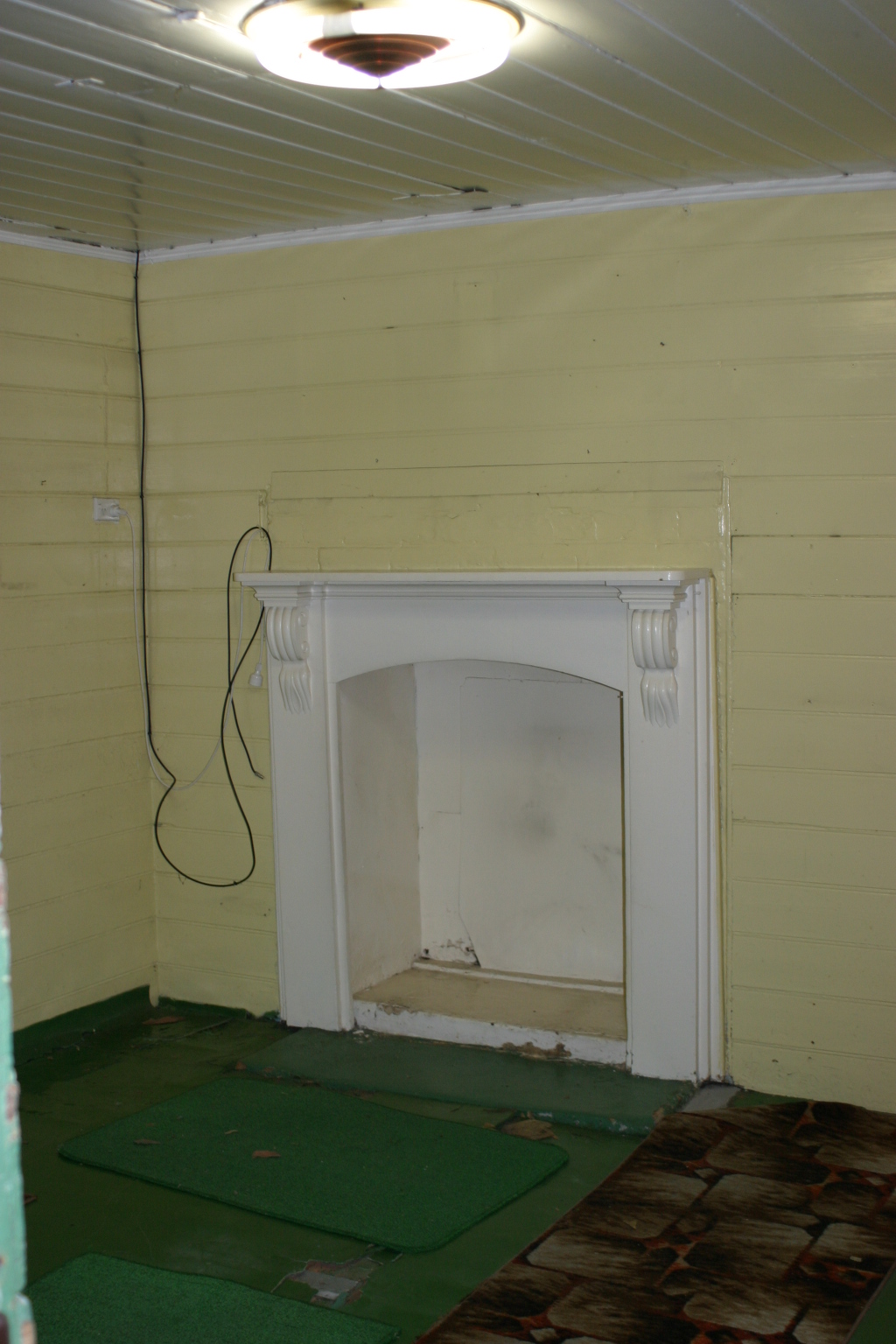 Old fireplace in dining room.