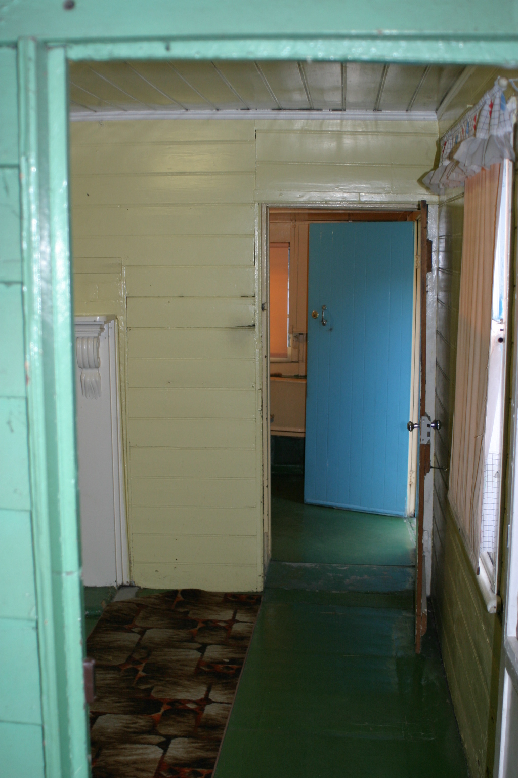 view from Dining room to kitchen.