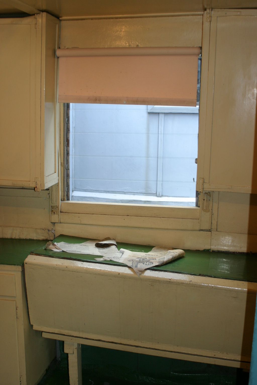 kitchen window with sink beneath.